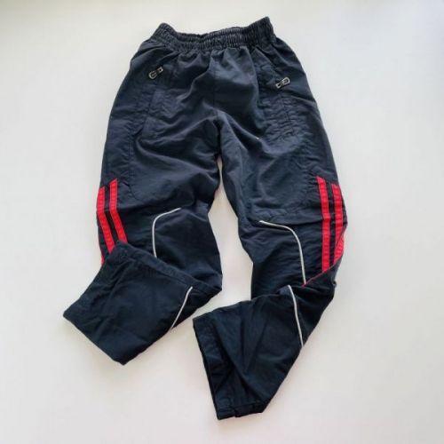 Černé šusťákové kalhoty, vel. 104